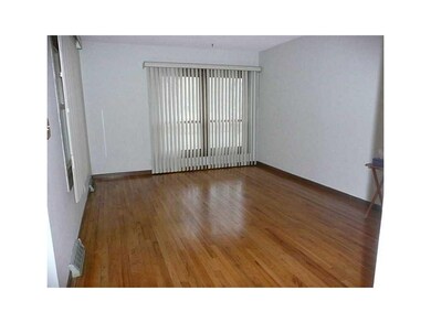 Living Room. Beautiful hardwood floors.