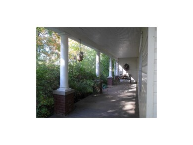 Shaded front wrap around porch