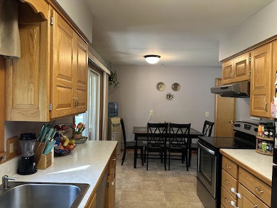 Kitchen opens to dining and 3-season porch!