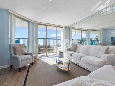 Living area featuring a wealth of natural light, a