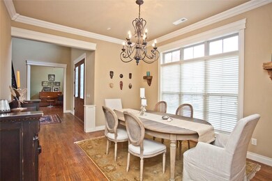 Formal Dining with hand scraped hard wood floors