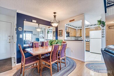 Dining space with wood flooring