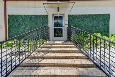 Well appointed shallow steps lead to front door.
