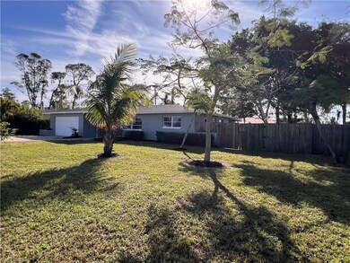 View of yard with a garage
