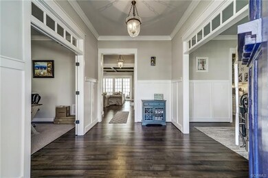 Foyer views through the home to the backyard.