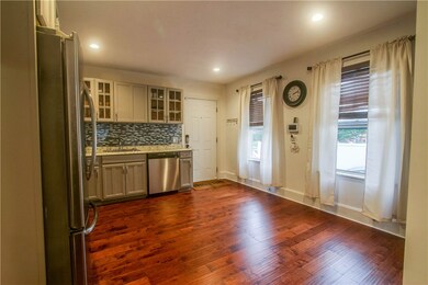 Looking through the kitchen to the front door with