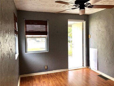 The Front Door opens into the 11x9 LIVING ROOM rec