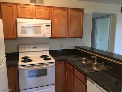 Kitchen includes all appliances and features grani