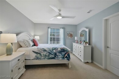 Bedroom featuring baseboards, visible vents, a cei