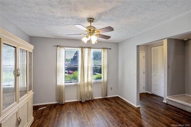 DINING ROOM: The dining room is complete with two 