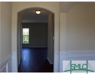 Other. Entryway looking down long foyer with wains