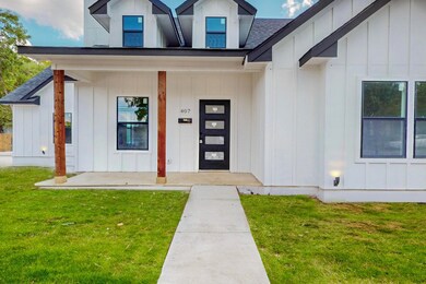 407 E Martin Luther King jr Dr, Ennis, TX 75119 - photo 3