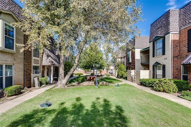 View of property's community with a yard and a residential view