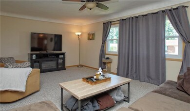 Spacious living room with lots of natural light.