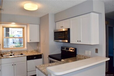 Kitchen with breakfast bar.