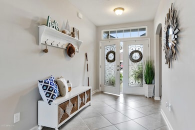 foyer with diagonal tiled flooring