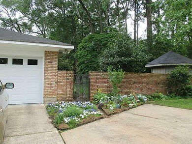 Landscaping. Inviting flower bed to great you.  Se