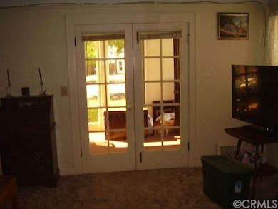 French doors that open to porch.