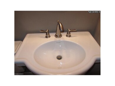Powder Room has been updated with premium fixtures