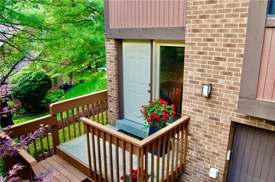 Enjoy the front porch and private side yard at thi