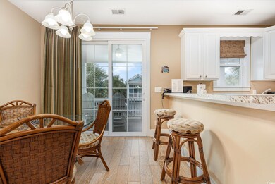 Dining room featuring an inviting chandelier and l