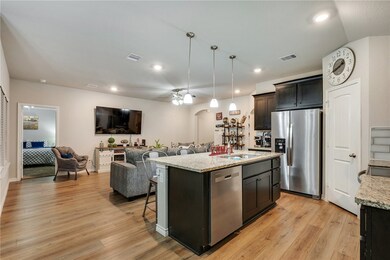 Kitchen with appliances with stainless steel finis