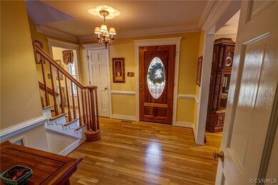 Generous Foyer with guest closet and custom front