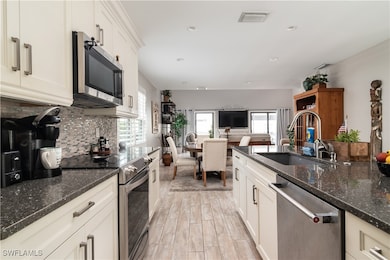 830 Meadowland Dr unit A, Naples, FL 34108 - photo 5