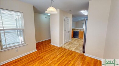 Front Entry and Kitchen. Tons of natural light