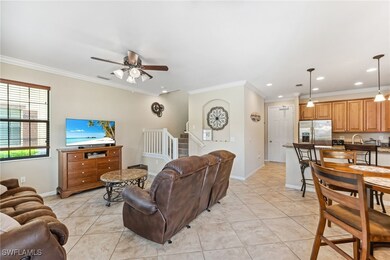 Living room with light tile patterned flooring, cr