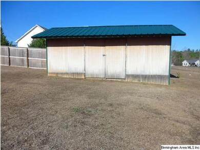 Large custom built storage building! Great for law