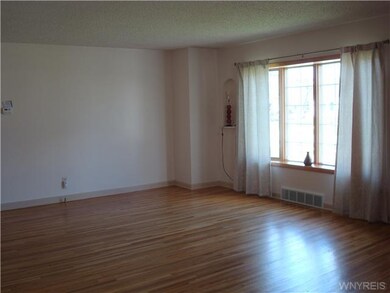 Living Room. Bay windowed living room and beautifu