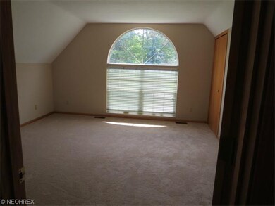 The second floor Master Bedroom features a palladi