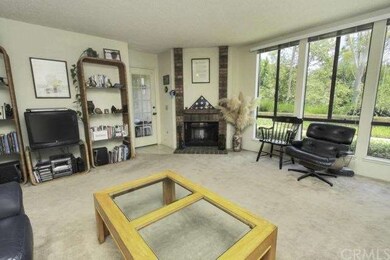 Bright as can be living room with golf course view