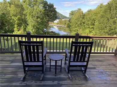 Deck overlooks the pool. Lakehouse is completed in