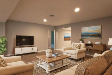 (Virtually Staged) Inviting living room with a TV, comfortable couches, and a coffee table. Designed with modern aesthetics, it’s perfect for relaxation and entertainment.