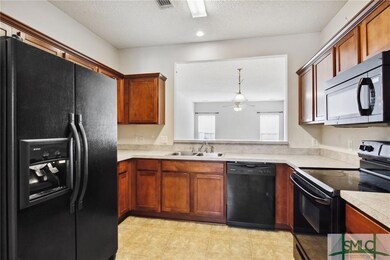 Pantry, side-by-side refrigerator with dispensers.