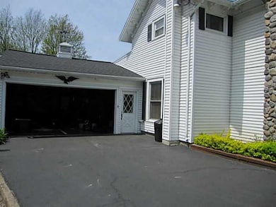Exterior Front. 2.5 + Car Attached Garage