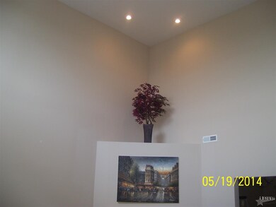 Two Story Can Lights Above FP