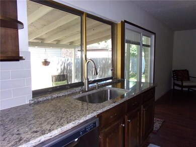 Kitchen sink over looking covered patio