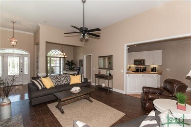 Living room has ceramic tile flooring that looks l