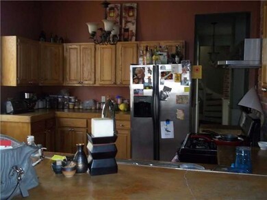 Kitchen. Stainless appliances, concrete countertop