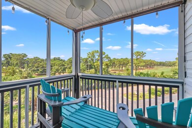 Sunroom featuring ceiling fan
