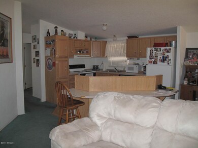 Kitchen from living room and entry