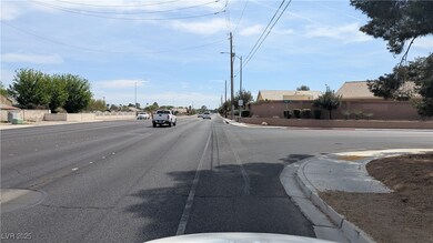 View of street with curbs, street lighting, and si