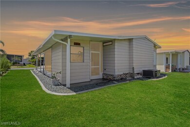 The rear of the home offers a comfortable screened