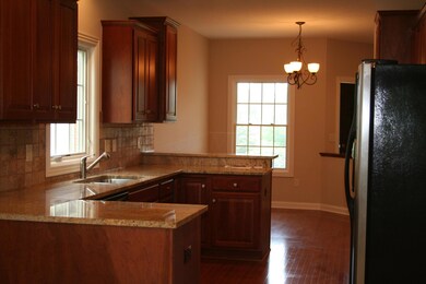 KITCHEN VIEW AND EATING AREA