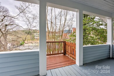 City views, flowering trees (and note the stair gate!)