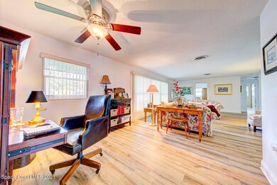 office area open to living room