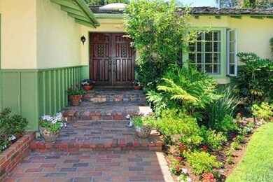 BRICK WALKWAY TO DOUBLE DOOR ENTRY